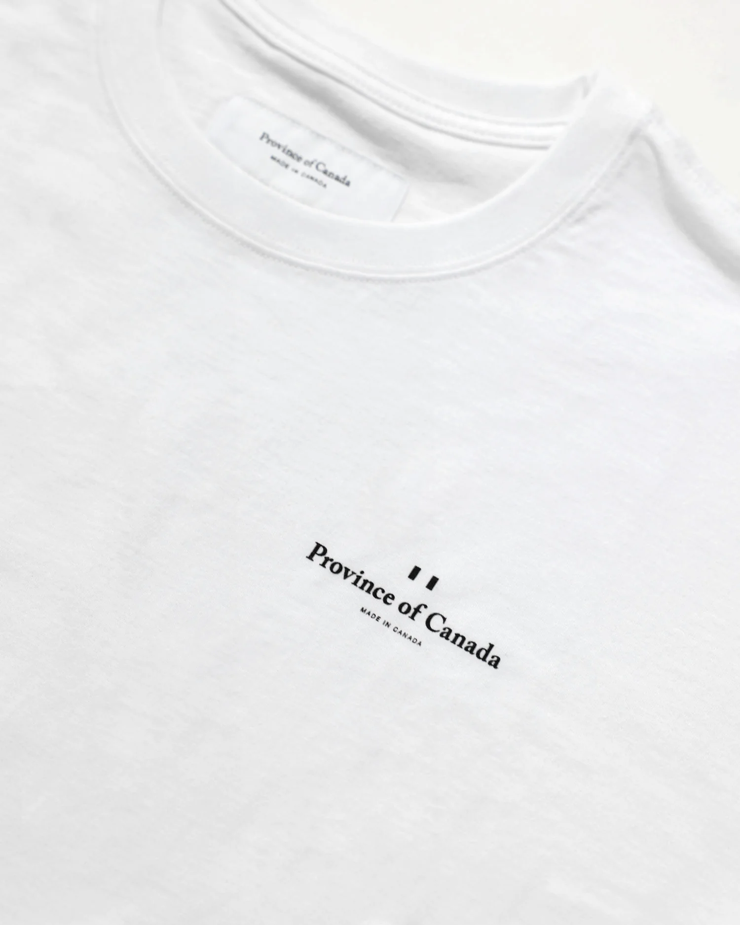 Left Chest Logo Tee White - Unisex - Image 4